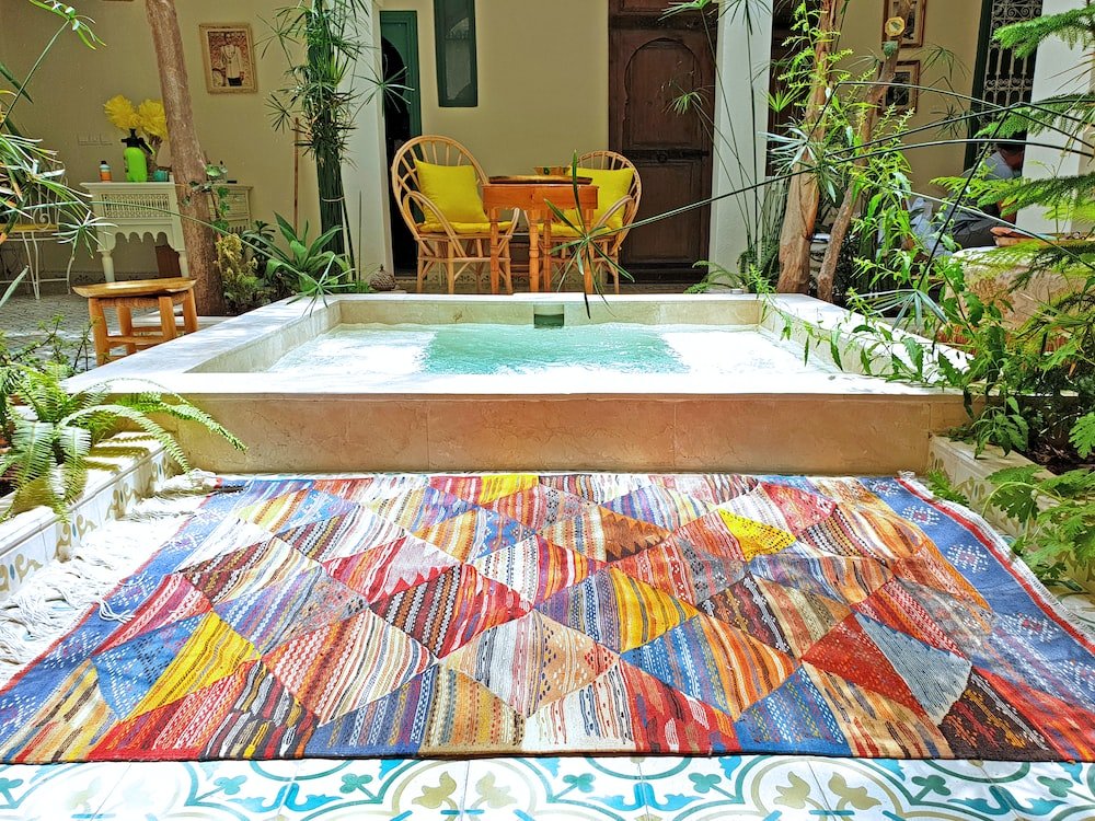 Do Rugs Make Floors Less Squeaky? yellow and brown chair beside table