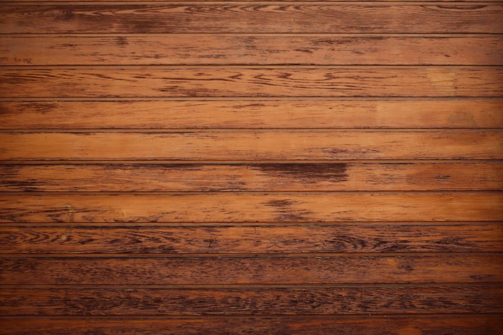 How To Soundproof A Wooden Floor? brown parquet board