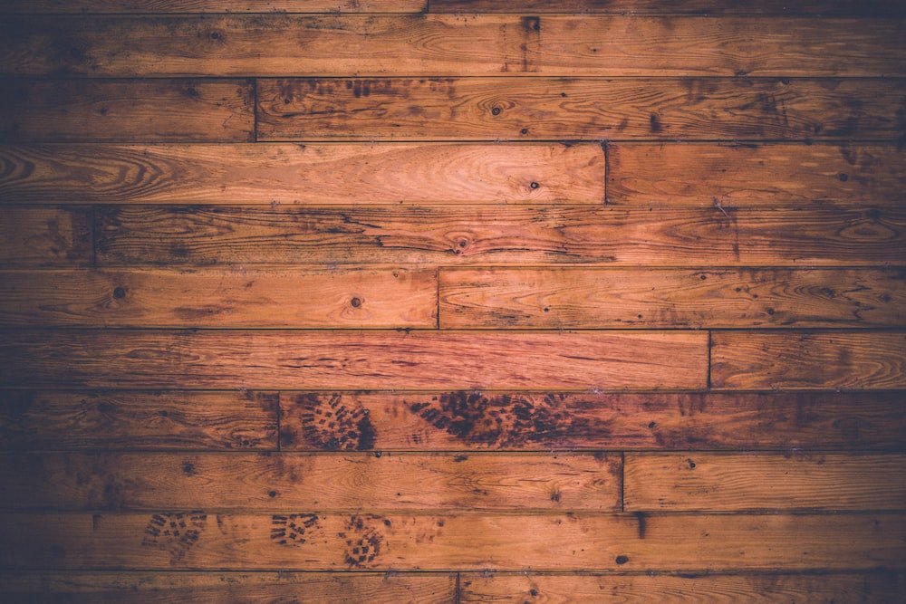 How To Soundproof A Wooden Floor? brown wooden board
